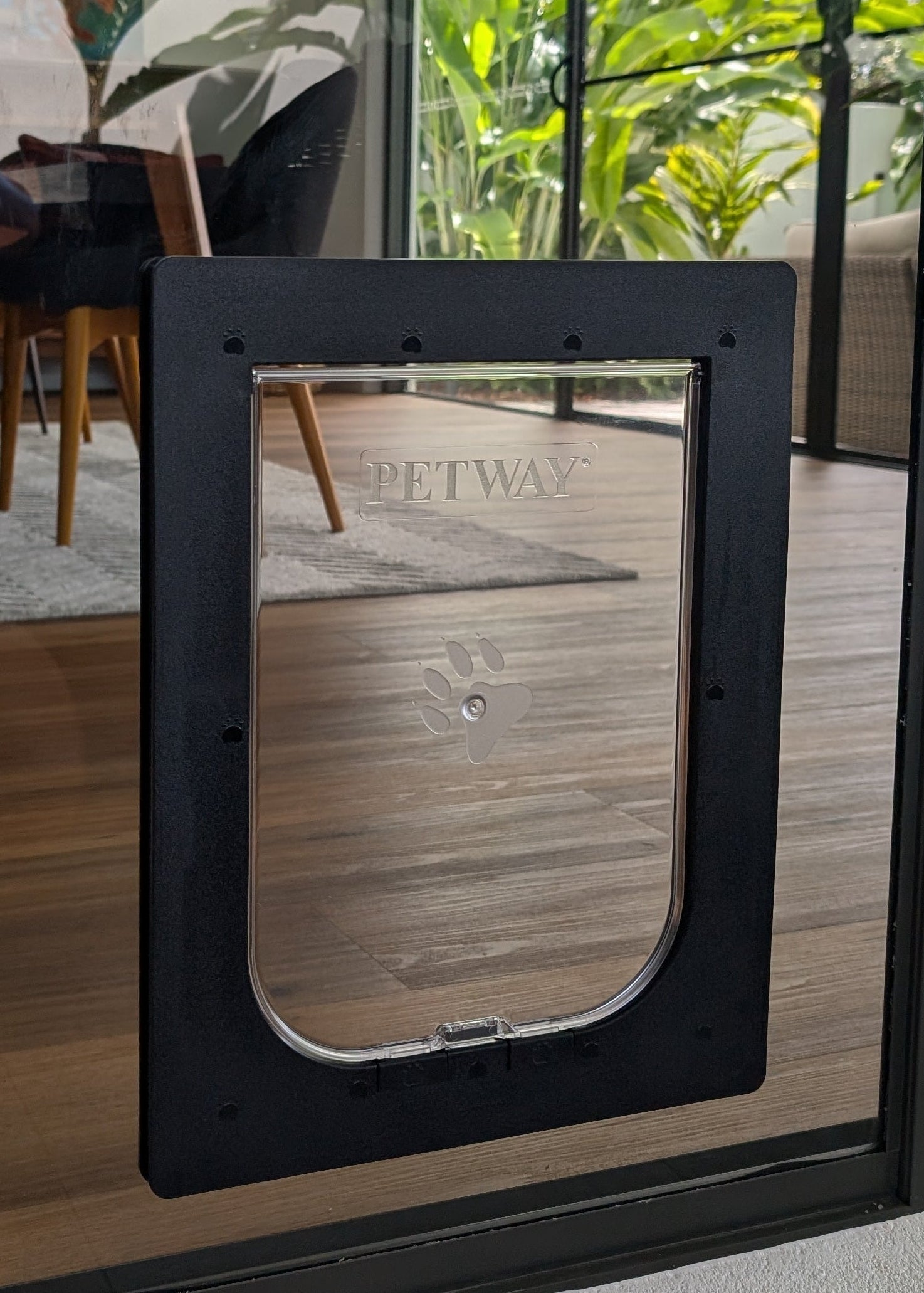 Pet door installed in a glass sliding door 